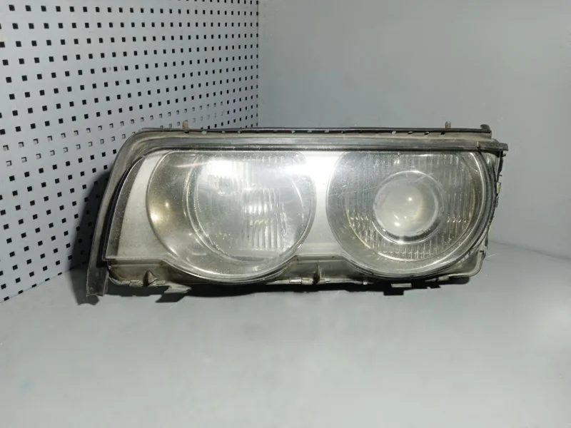 Фара левая BMW Е38