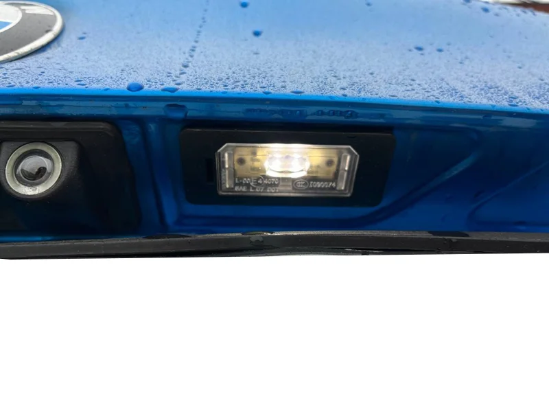 Фонарь подсветки номера BMW E82 E88 E90 E92 E70 E71 E84 F10 F15 F16 F25 F30 F32 F34 F45 F48 G01 G05 G20