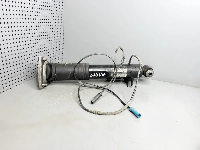 Амортизатор задний левый BMW E70