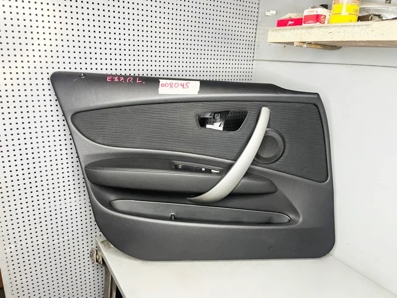 Обшивка двери передняя левая BMW E87