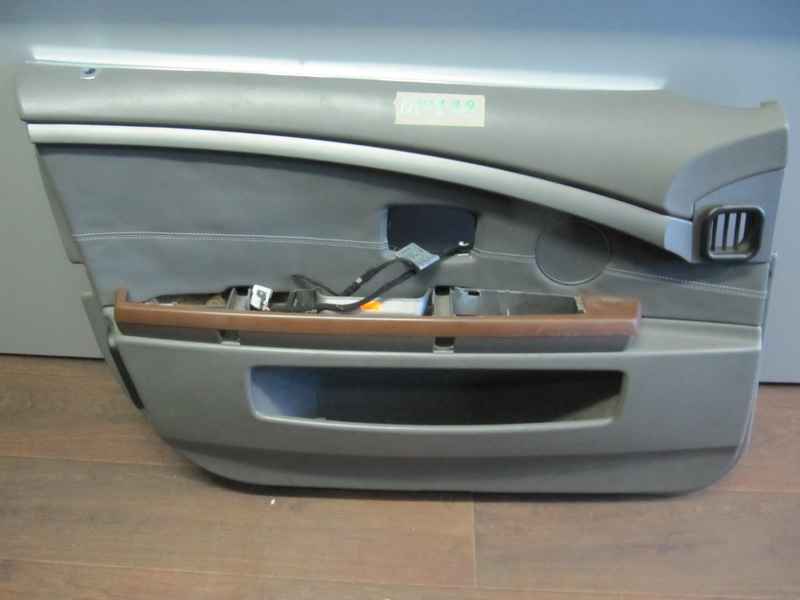 Обшивка двери передняя левая BMW E65