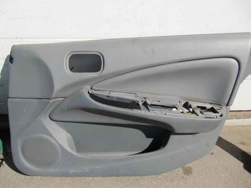 Обшивка двери передней правой Nissan Almera B10