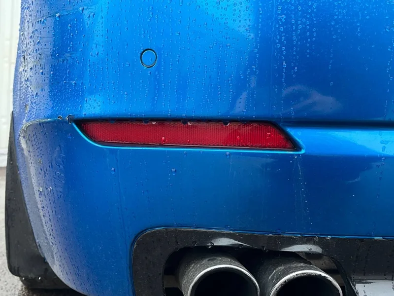 Отражатель в бампер задний левый BMW F10
